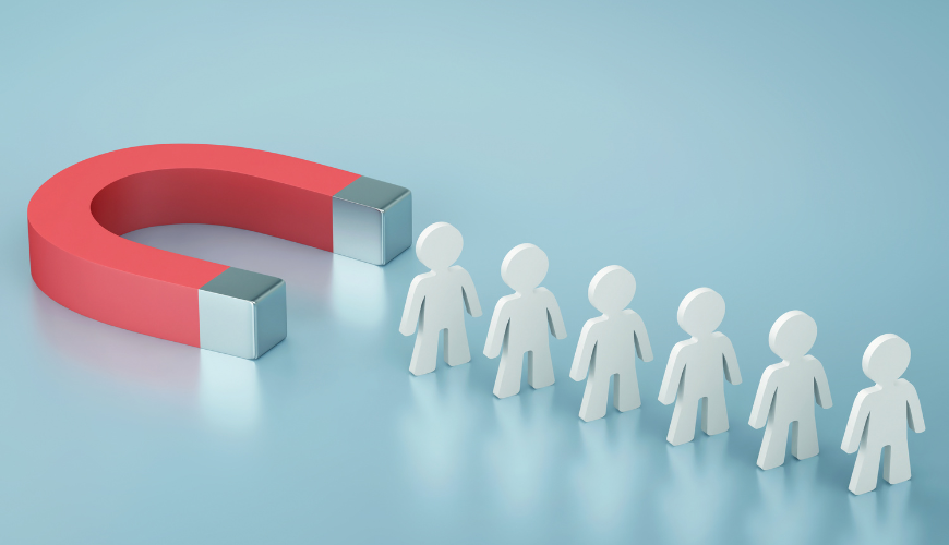 Illustration of a magnet attracting people, representing effective customer retention strategies