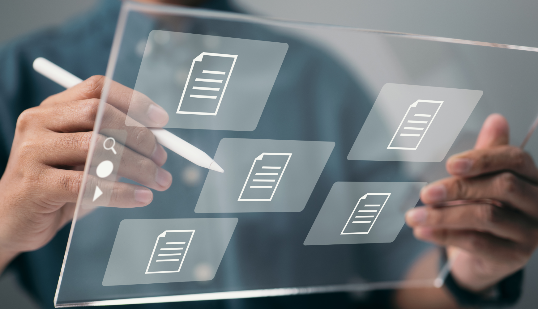 A man holds a tablet displaying document icons, symbolizing custom web apps development and digital solutions.